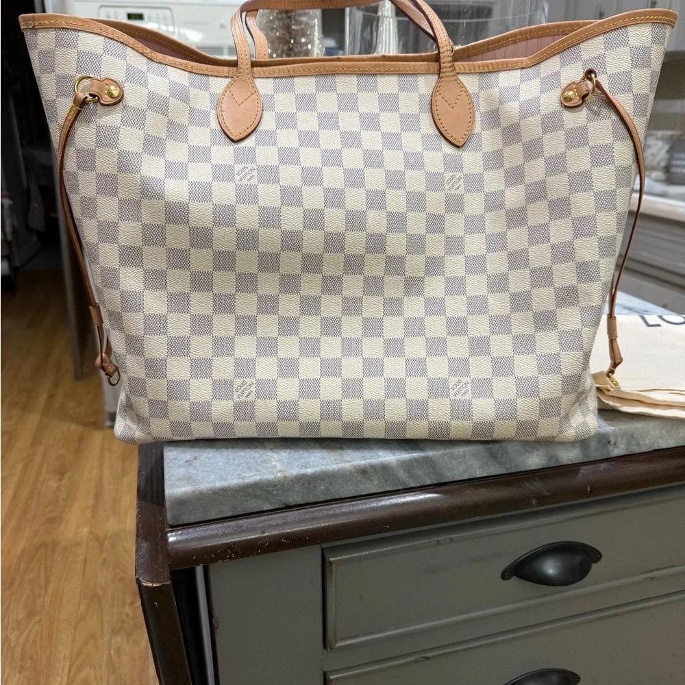 Louis Vuitton Never-Full GM. 2021 Damier Azure purchased via Poshmark. - Picture 12 of 14